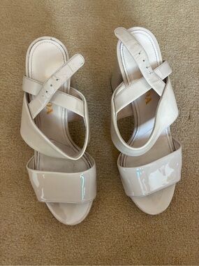 Prada Patent Leather Crisscross Heels in Cream